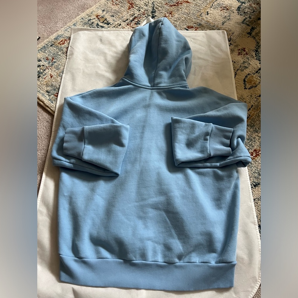 Vuori Restore Full Zip hoodie in the color “spring” blue. - Picture 4 of 8